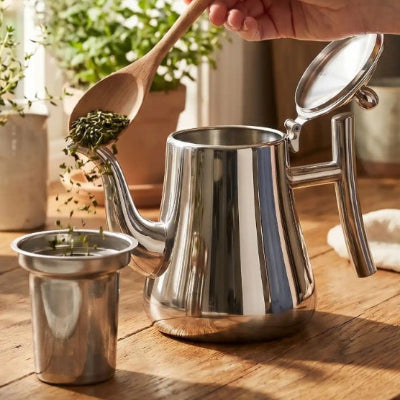 main versant feuilles infuseur de théière inox