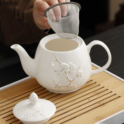 Théière porcelaine blanche avec infuseur