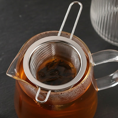passoire a the dans theiere en verre