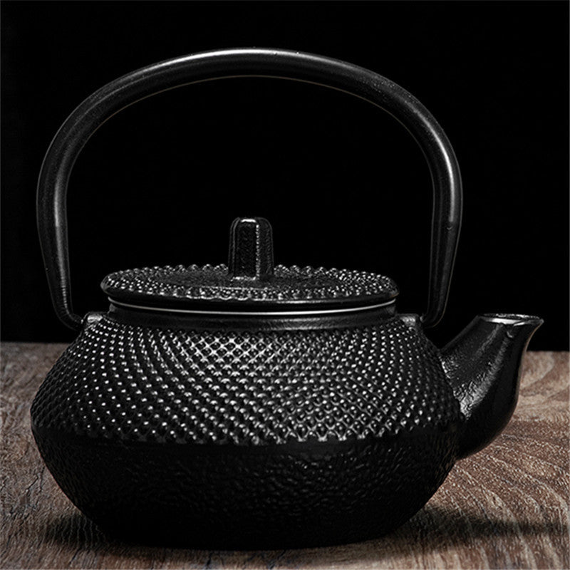 Théière en fonte noire