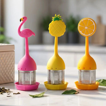 trois infuseurs a the sur un comptoir